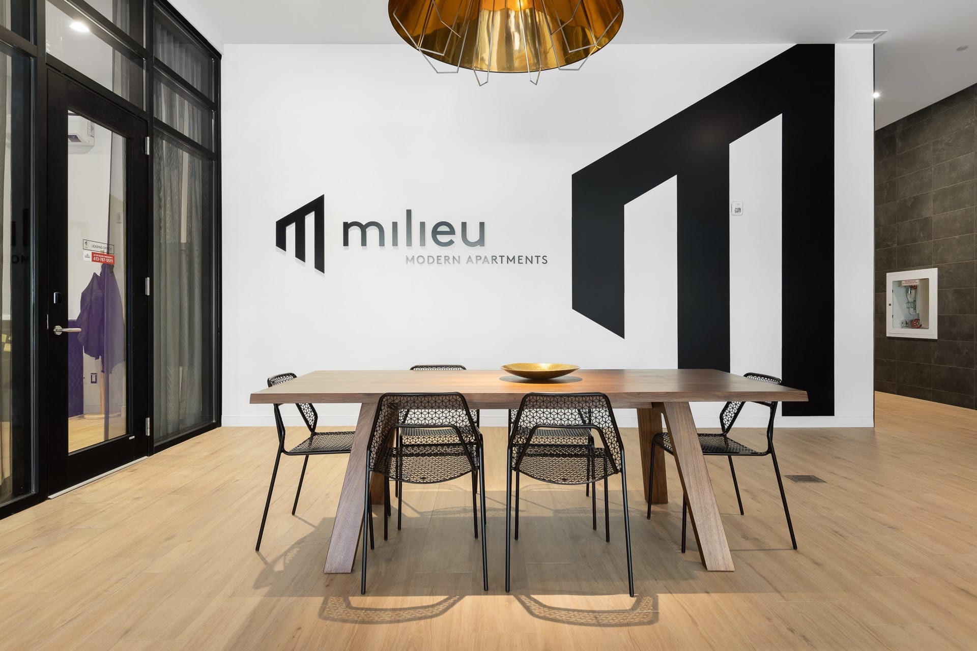 Milieu - Logo on interior of the building