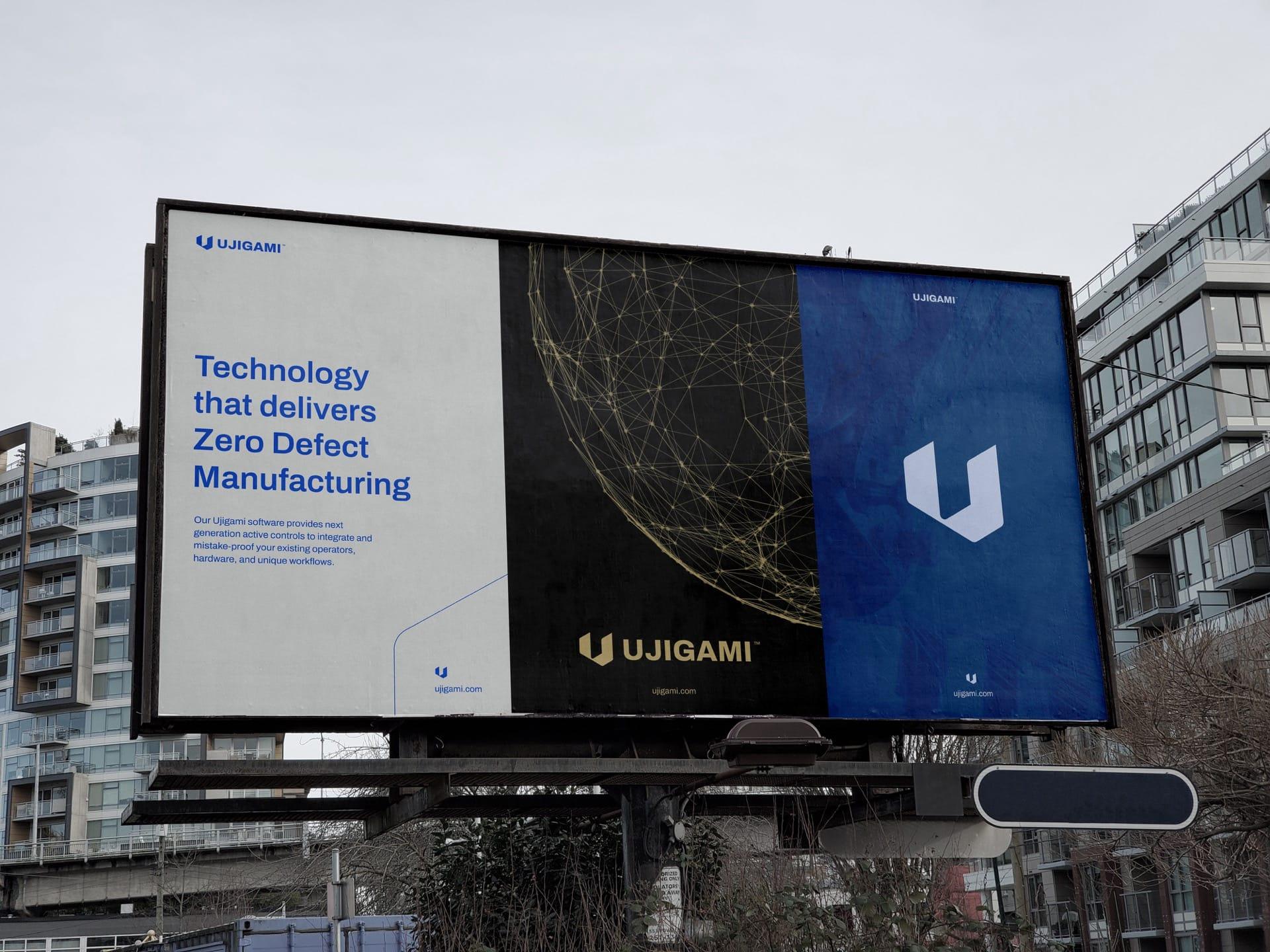 A large billboard showing off the Ujigami logo design