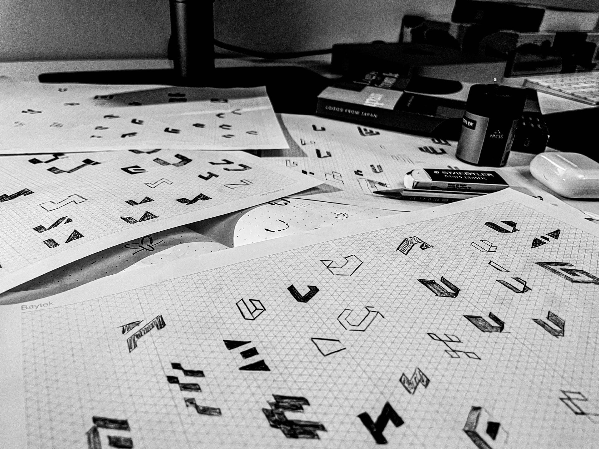 Sketching a logo design in Ottawa