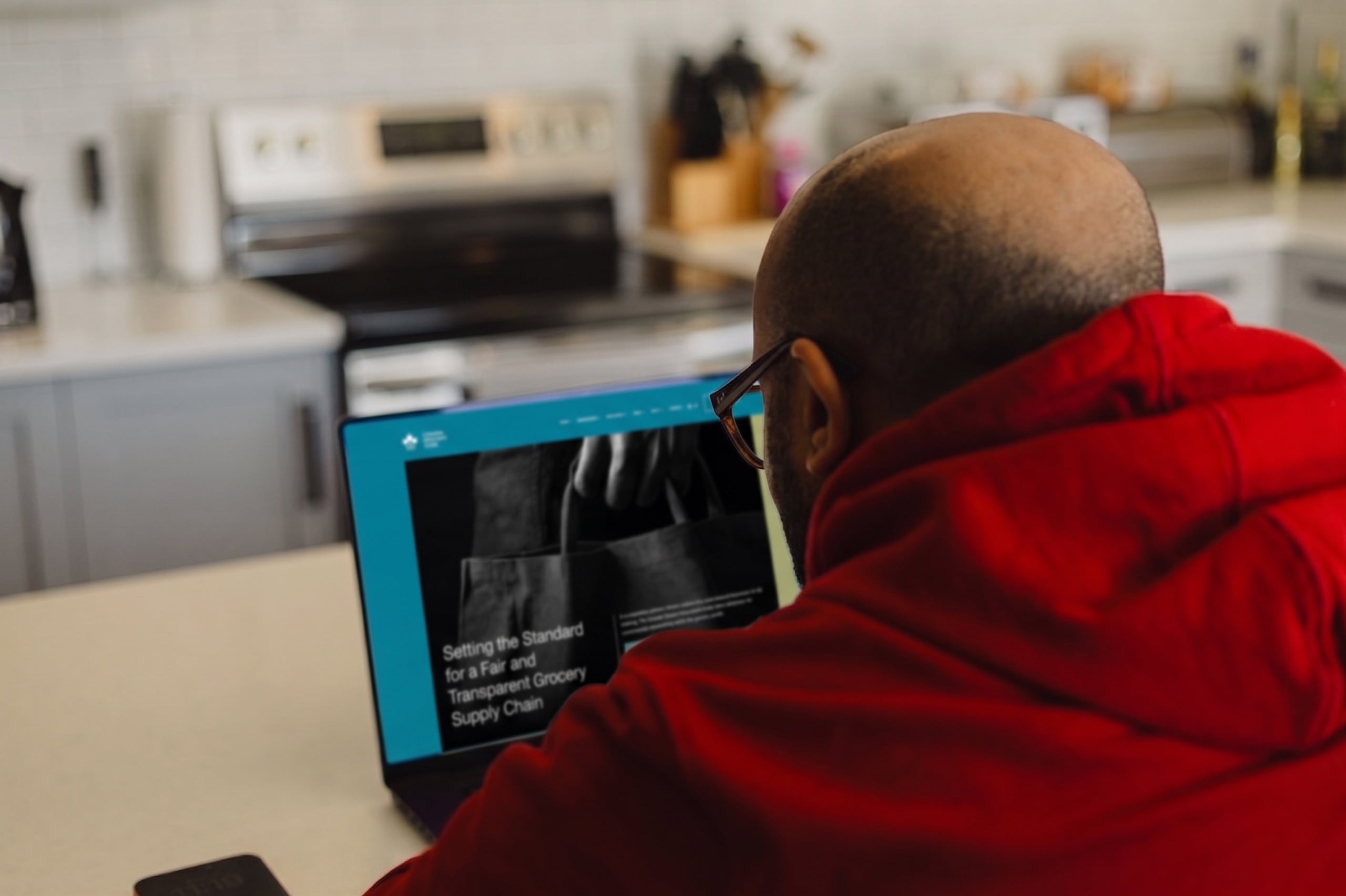 Marlon viewing an image on the laptop